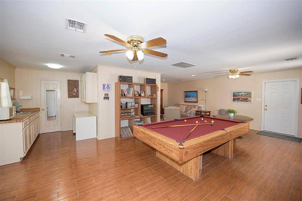 Home also provides an amazing game room which even has a kitchenette area and bath with shower.