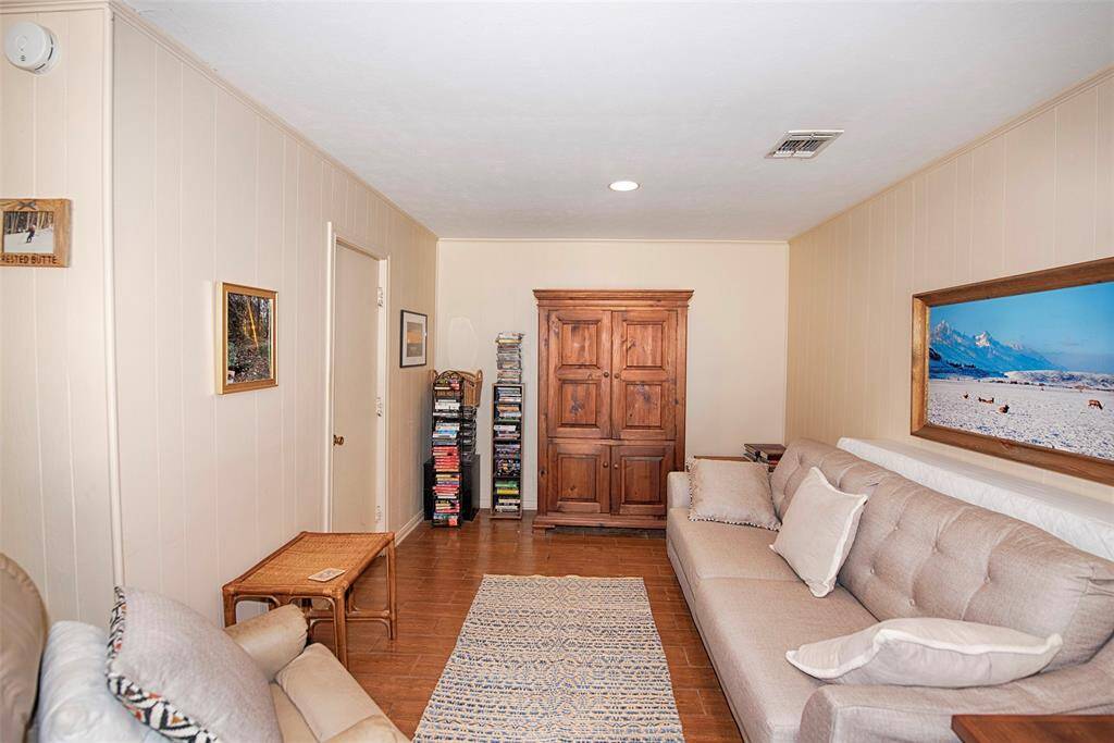 A great sitting area as well to relax and maybe use for movie night or just a spot to read.  Behind the door is an office/study area.