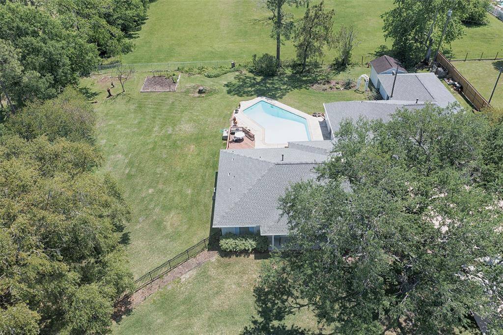 An aerial view showing the amazing space and pool in the backyard.