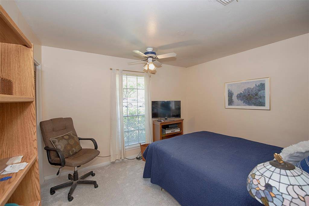 Additional bedroom is perfect for your guests or one of the kids. Room features recently installed carpet.
