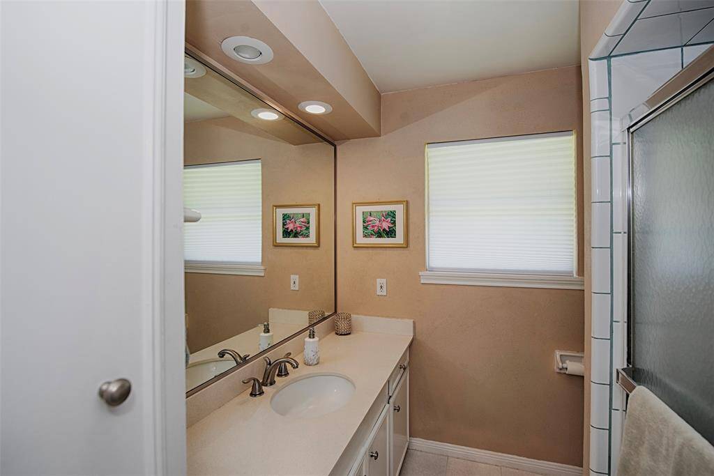 The 2nd bathroom with large walk in shower has built in cabinetry for linens, towels and bathing essentials.