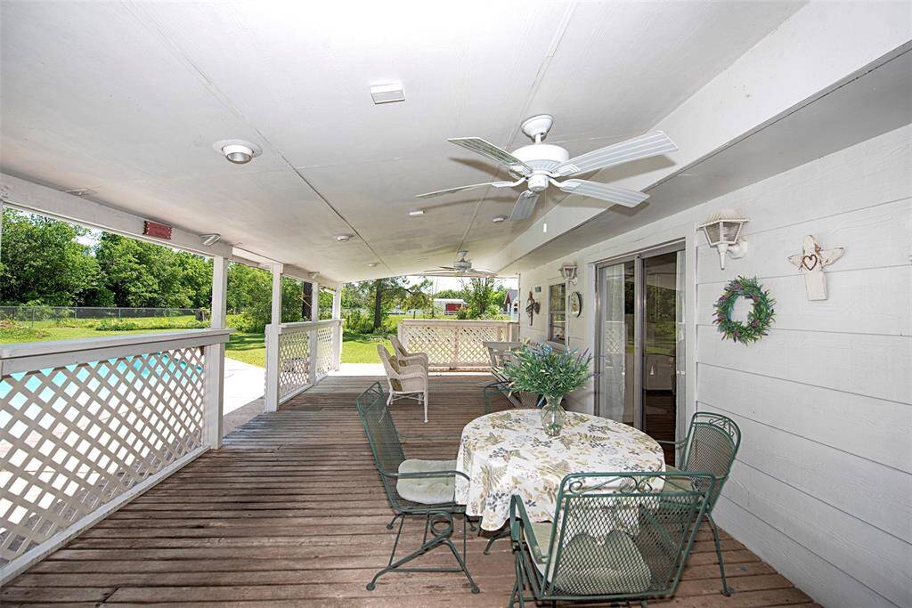 Off the sun room is a wonderful 31 x 13 oversized covered patio. This patio is so large it could easily boast an outdoor kitchen!