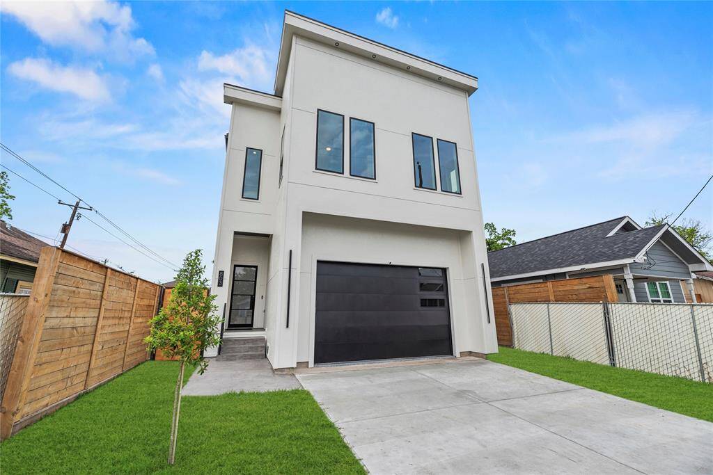 Unique contemporary design with wide outdoor living space with a convenient long driveway ideal for family and guests.