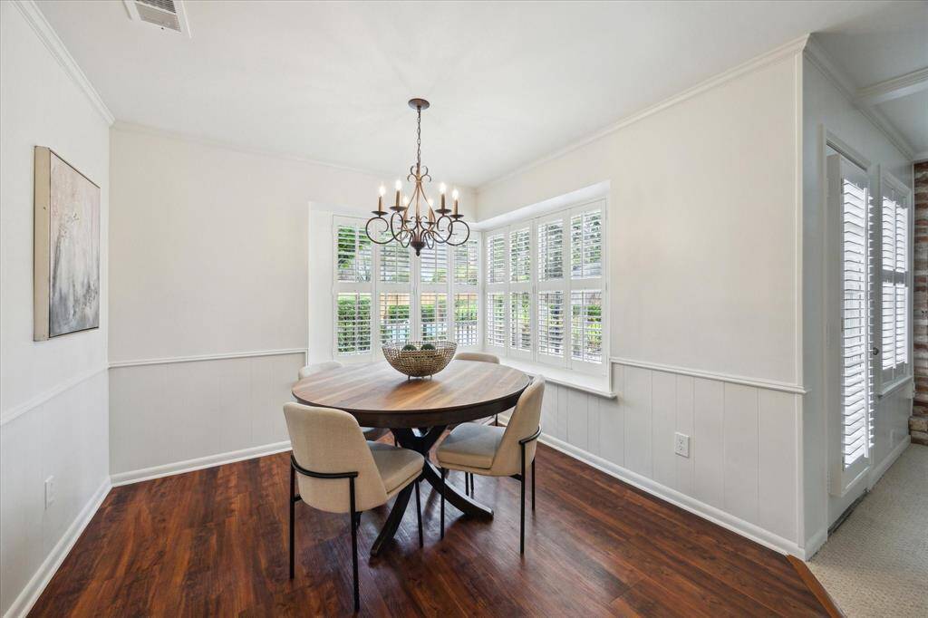 Breakfast room with cozy window seating is a great place to gather with family