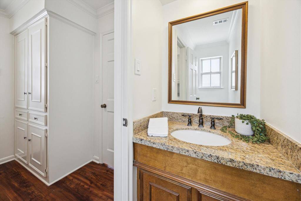 Half bath conveniently located inside the back door for guests use.