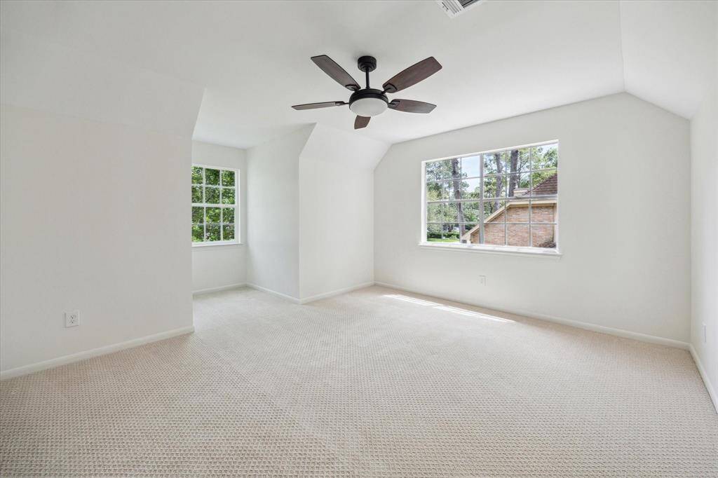 Upstairs guest bedroom with plantation blinds, fresh carpet and paint.