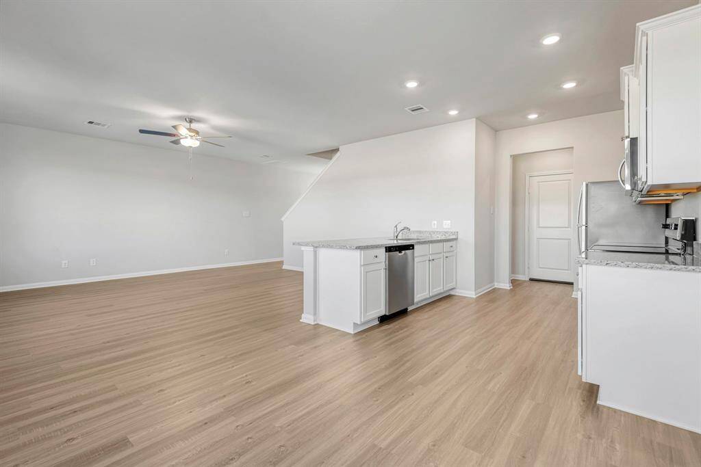 You will love the open concept layout of the kitchen and living room space. Great for entertaining!
