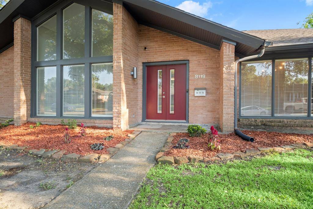 The Red Door welcomes you to a modern wonder in the suburbs with natural light peeks through large windows, and well-maintained landscaping.
