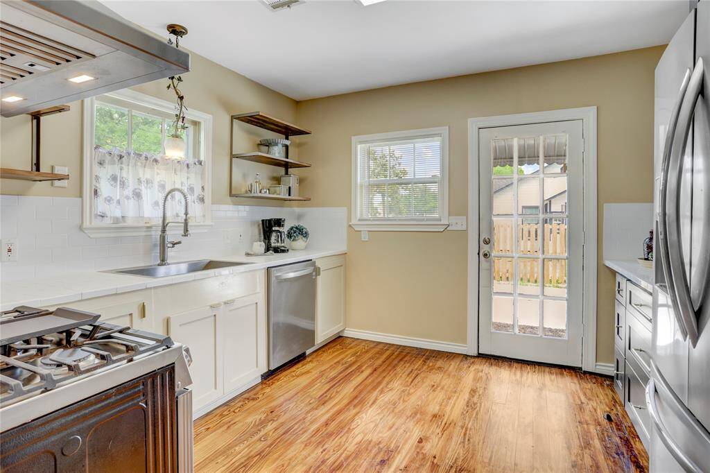This kitchen has been updated from soup to nuts! Thoughtful space planning makes excellent use of the area without feeling cramped or crowded.