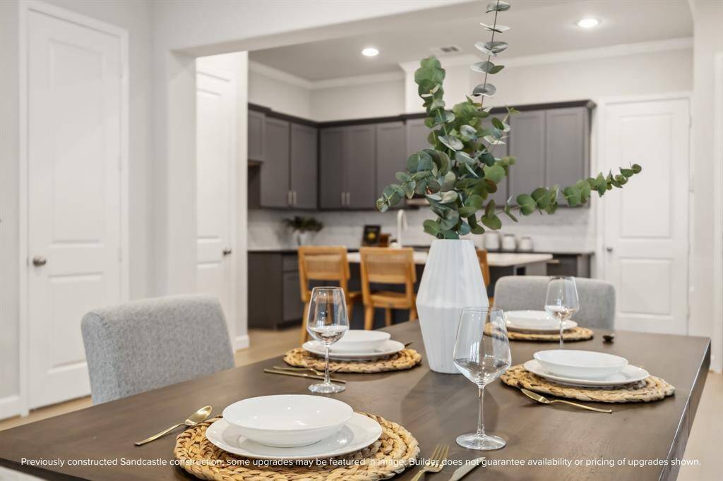 Crown molding throughout the downstairs adds an elegant touch to your everyday dining experience.