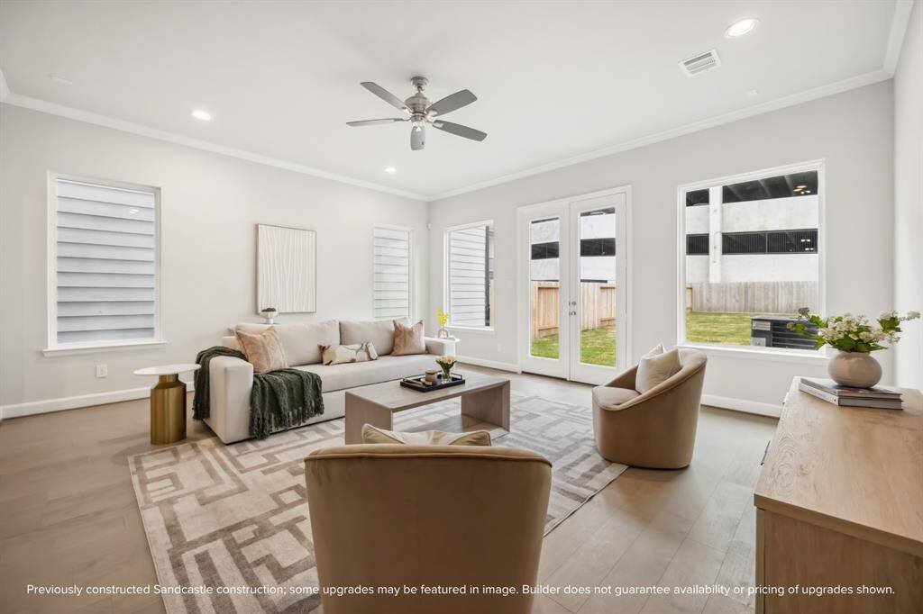 Design your ideal living space with room for multiple furniture groupings in this expansive area.