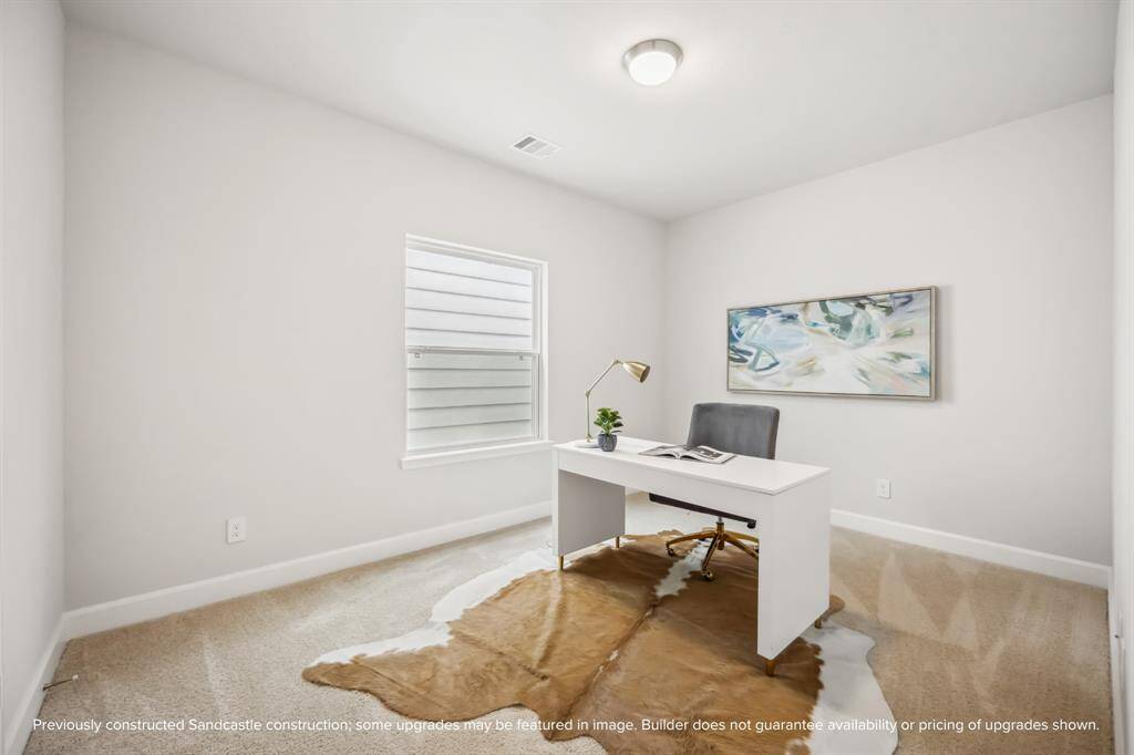 Perfectly sized, this secondary bedroom features a walk-in closet with custom shelving for maximum organization.