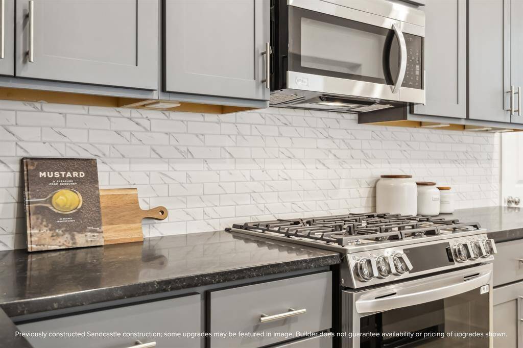 Cooking Made Easy. The gourmet kitchen boasts stainless steel appliances, a gas cooktop, and elegant designer finishes.
