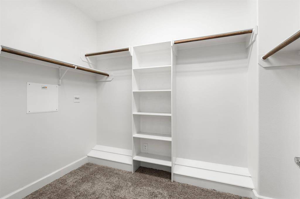 Large walk in primary closet.