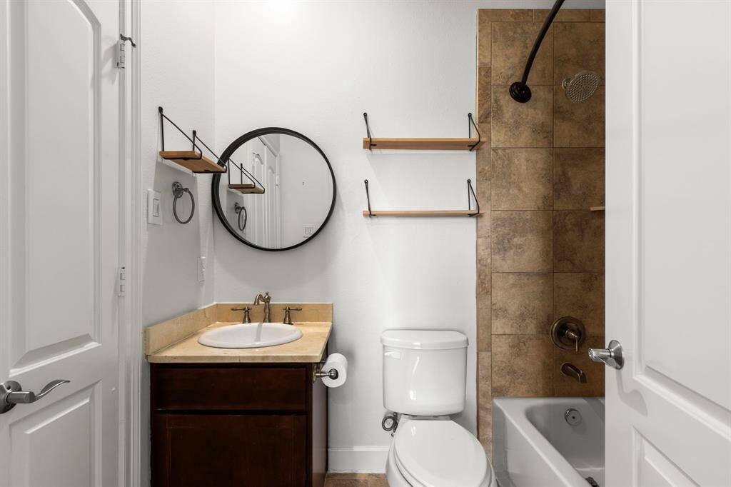 Bathroom to upstairs secondary bedroom.