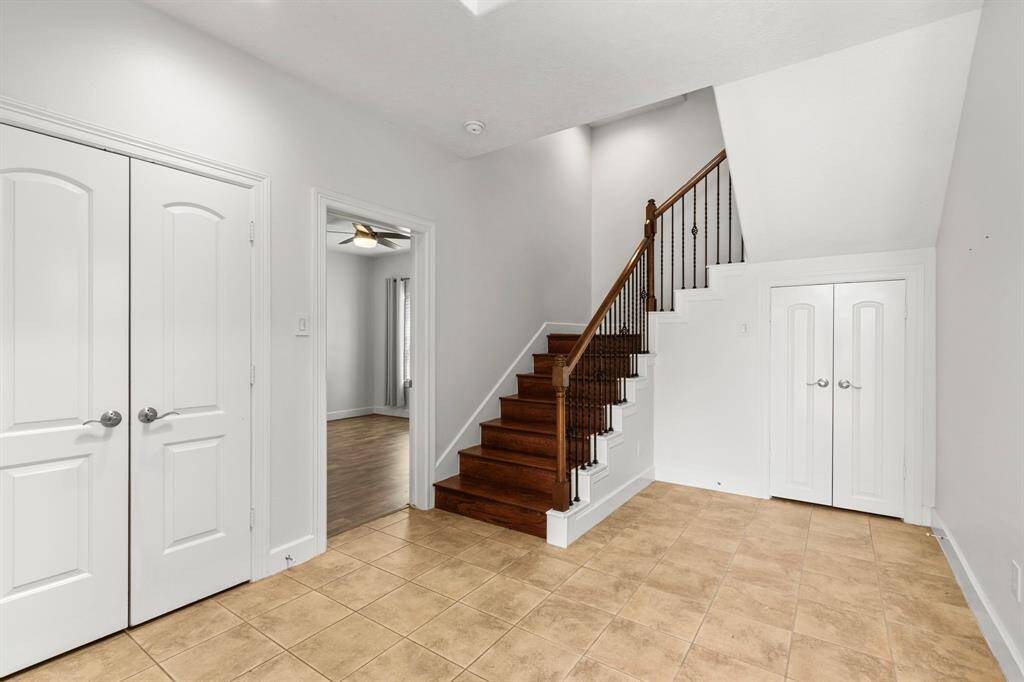 First floor ensuite bedroom to left of staircase.