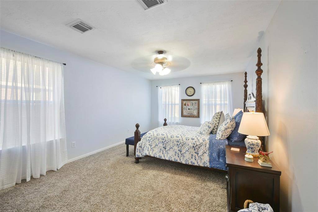 Oversized Primary suite with tons of natural lighting.