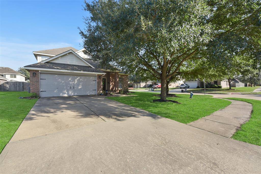 Spacious driveway and large corner lot!