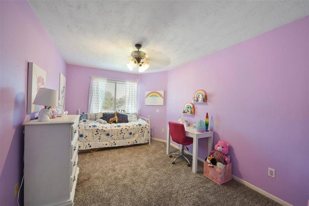 One of the secondary bedrooms upstairs.