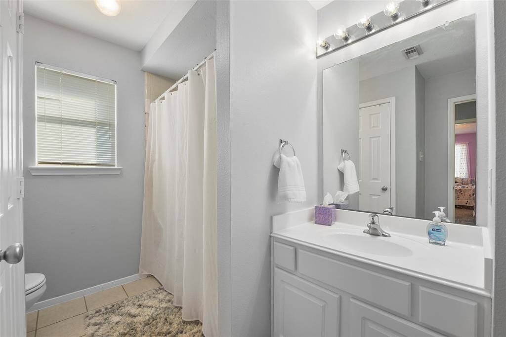Secondary full bath upstairs.