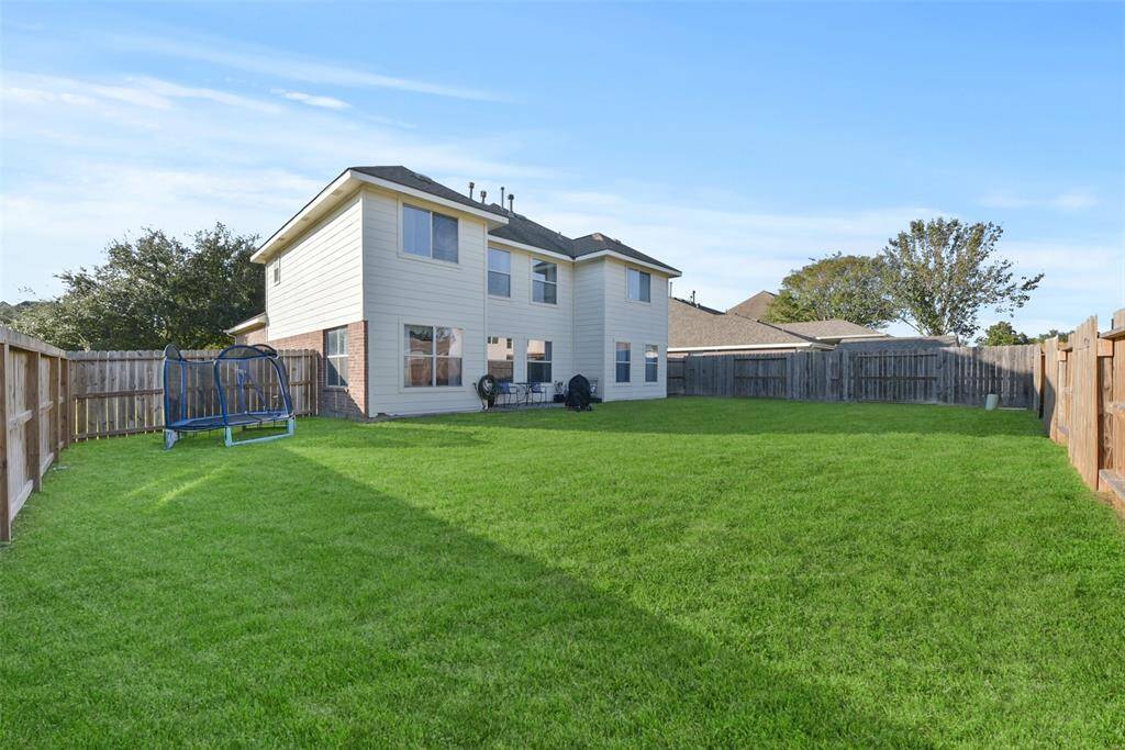 Great sized backyard provided by the corner lot that this beauty sits on!