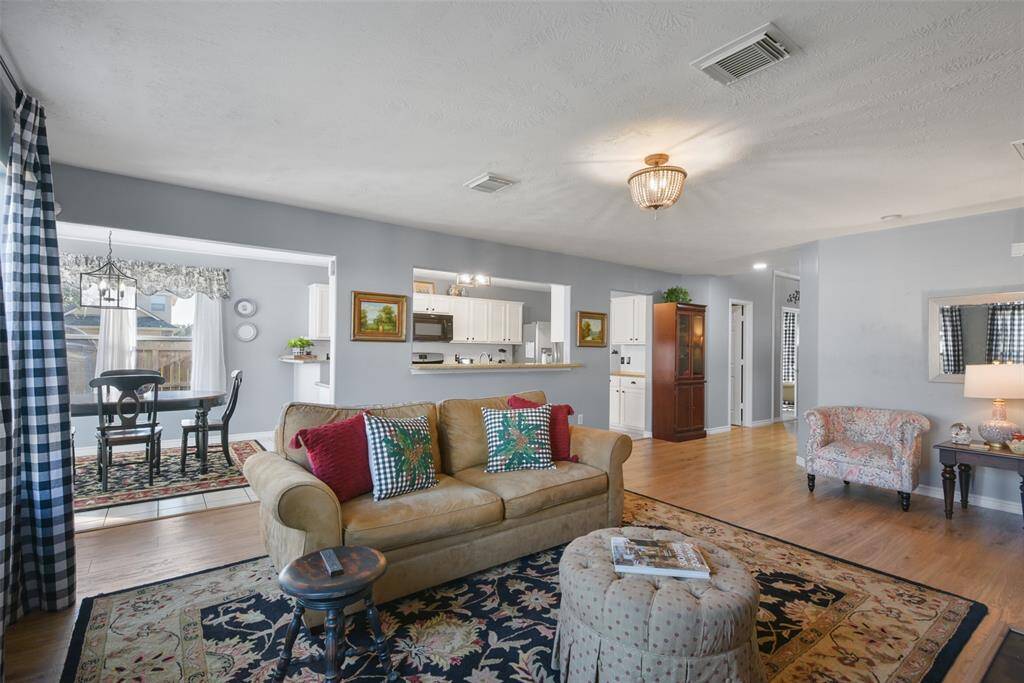 Kitchen opens up to the family room.