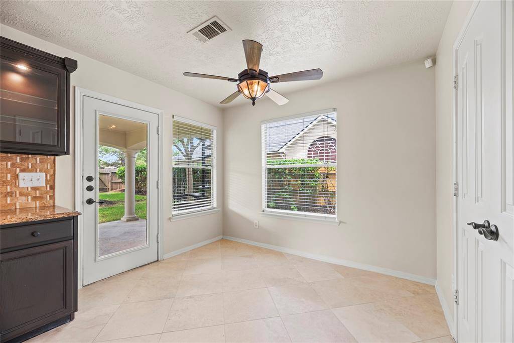 Your Breakfast Area is open to your kitchen area and has direct access to the over-sized covered patio.
