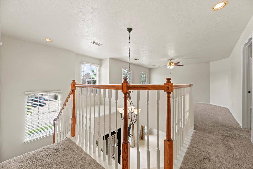 Your stairwell leading to the bedrooms has an abundance of natural lighting.**8615 Westcove Circle, Houston, TX 77064**