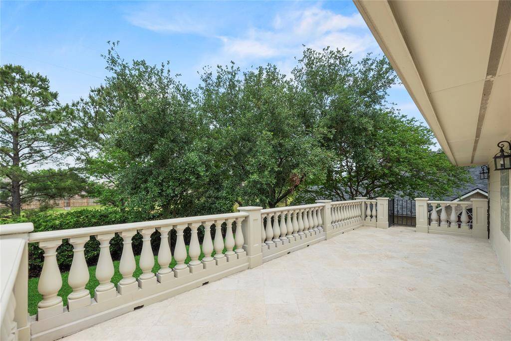 Your view as you step out of your primary bedroom onto your over-sized balcony.**8615 Westcove Circle, Houston, TX 77064**