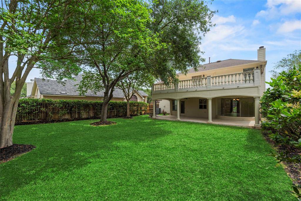 Enjoy the lush, private backyard oasis, ideal for relaxation and outdoor gatherings**8615 Westcove Circle, Houston, TX 77064**