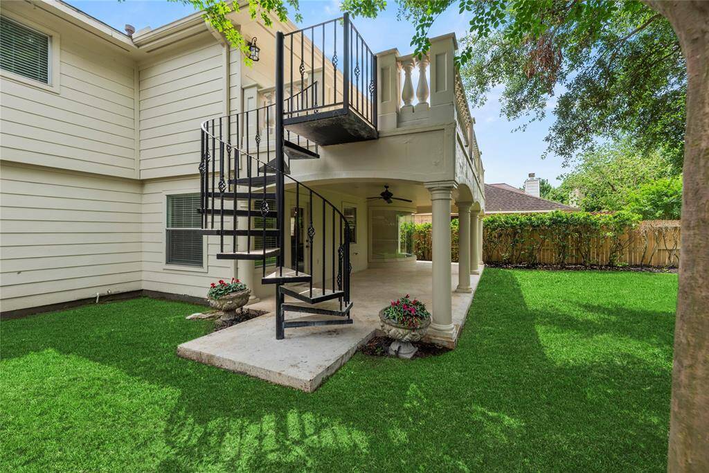 A picturesque spiral staircase leading to your huge private balcony.**8615 Westcove Circle, Houston, TX 77064**