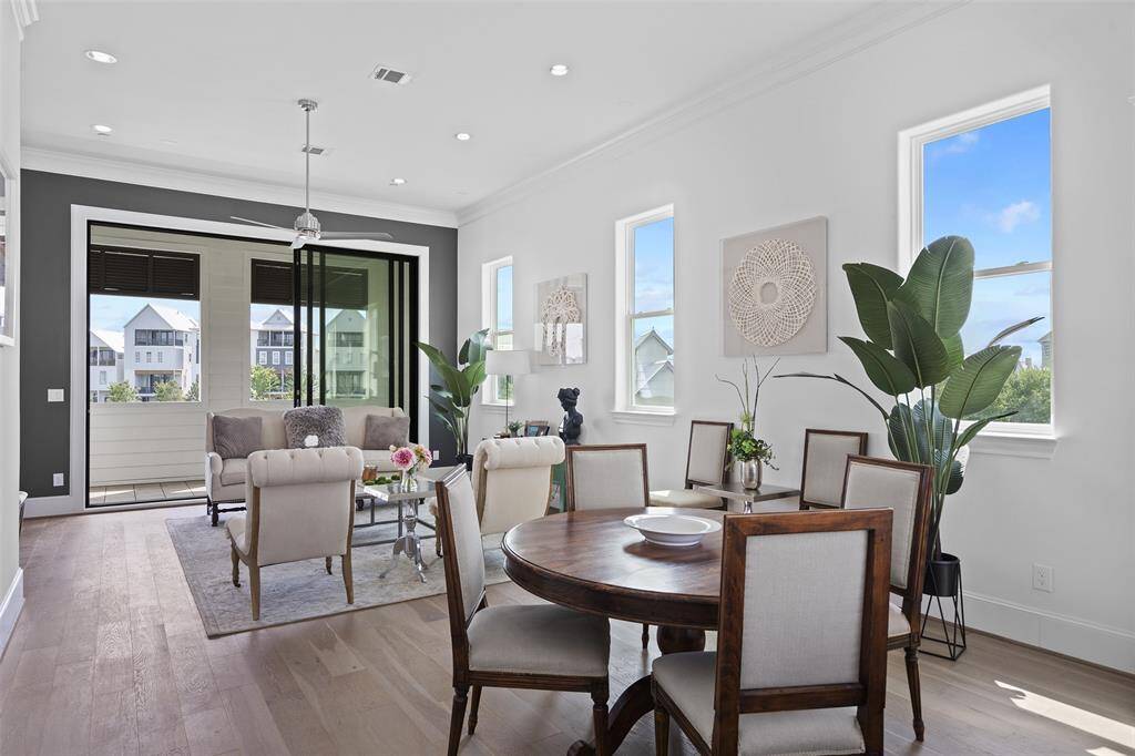 Soaring 12 FT Living Room Ceilings.  Double Crown Molding, Wide Plank Wood Floors
