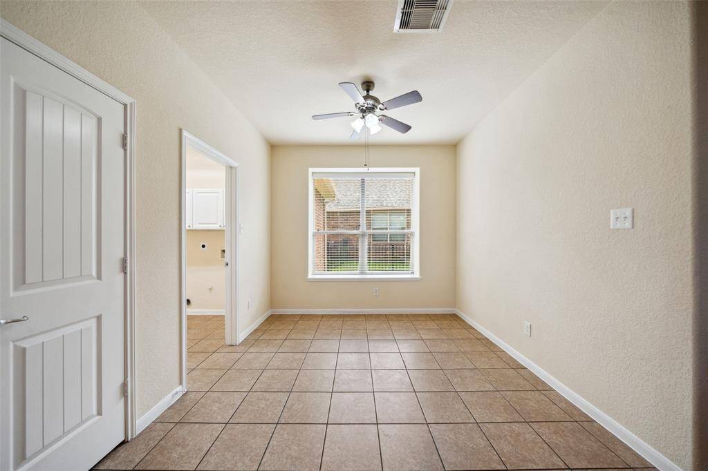Breakfast room and views leading into the utility room.