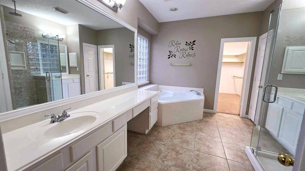 Enter your ensuite with two sinks