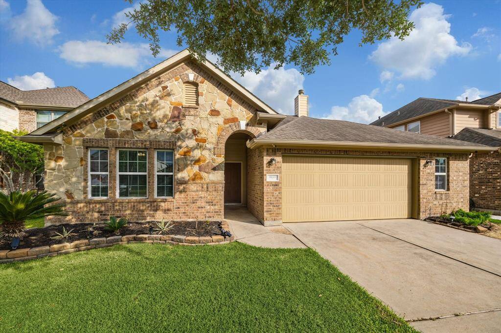 This 1.5-story Texas Hill Country–inspired home, blends elements of ranch-style architecture with traditional touches, creating a warm and inviting look with loads of curb appeal.