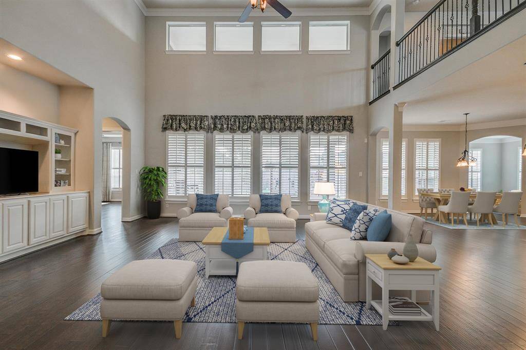 Large family room with two story ceiling.