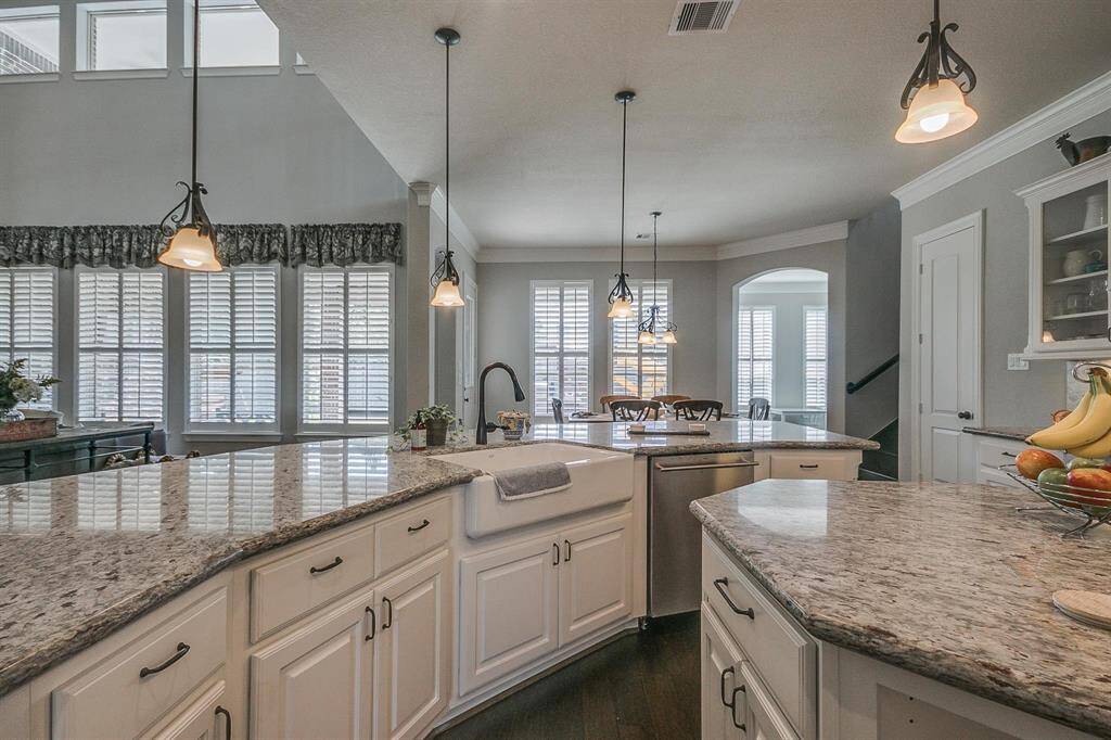 Spacious granite counter height bar.
