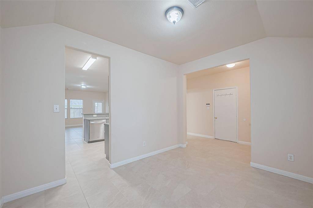Another view of formal dining room connected to the kitchen