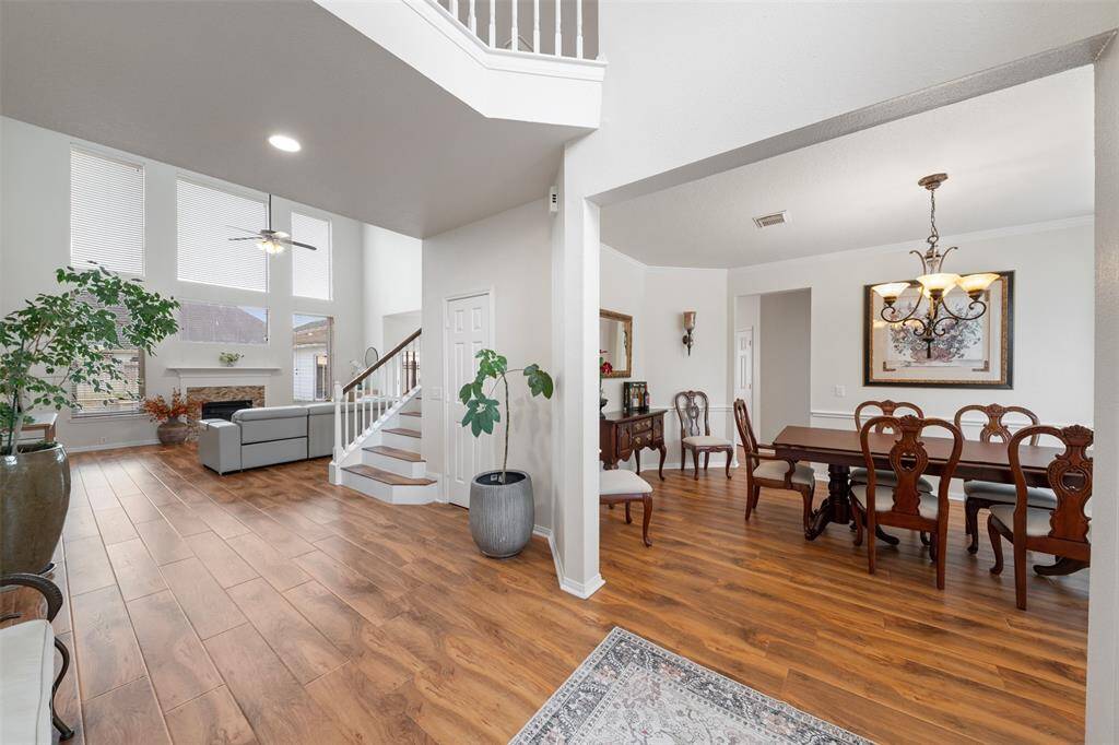Entry/Foyer looking at formal dining room and living/family room.