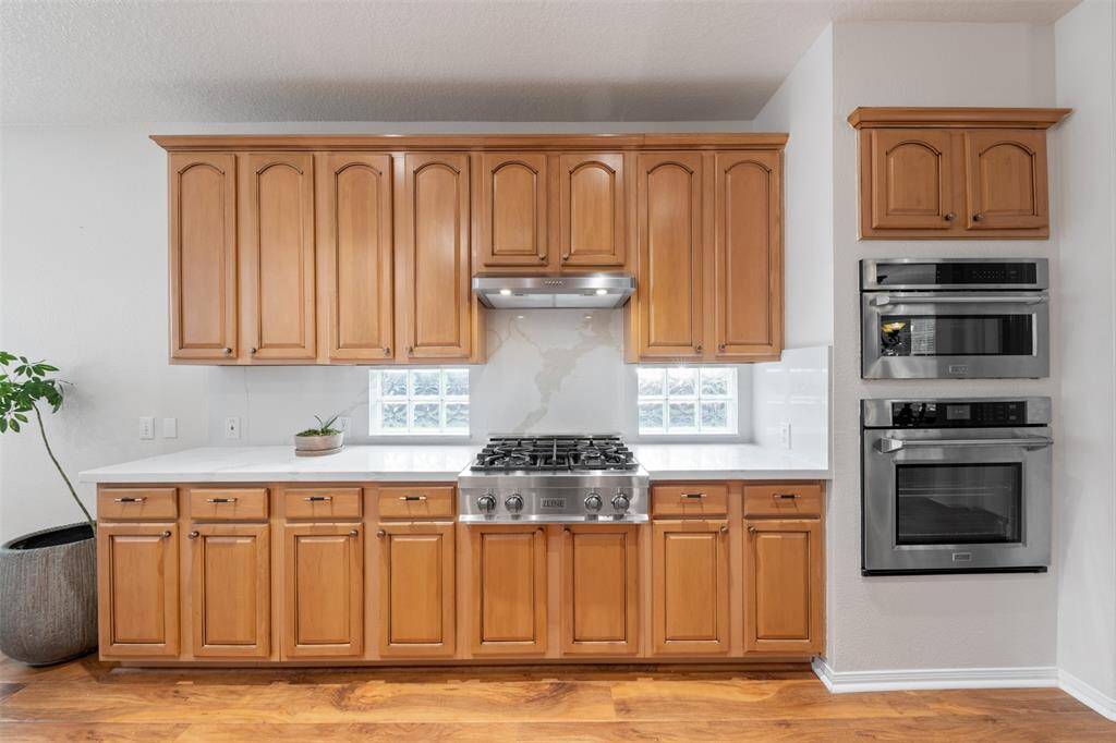 Kitchen with updated cabinets, quartz counters and ZLine SS appliances