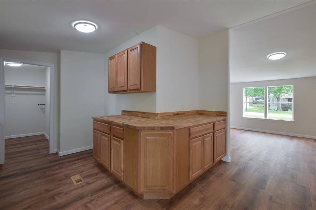 1/2 of the kitchen and the living room.