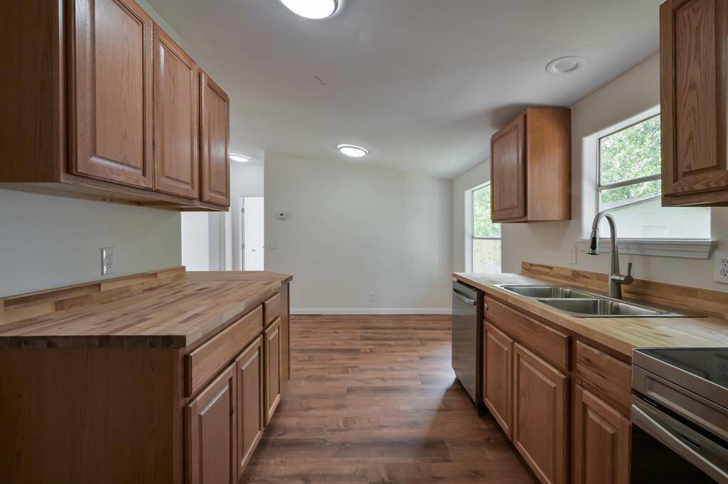 Laundry room facing the kitchen and the Dining area.