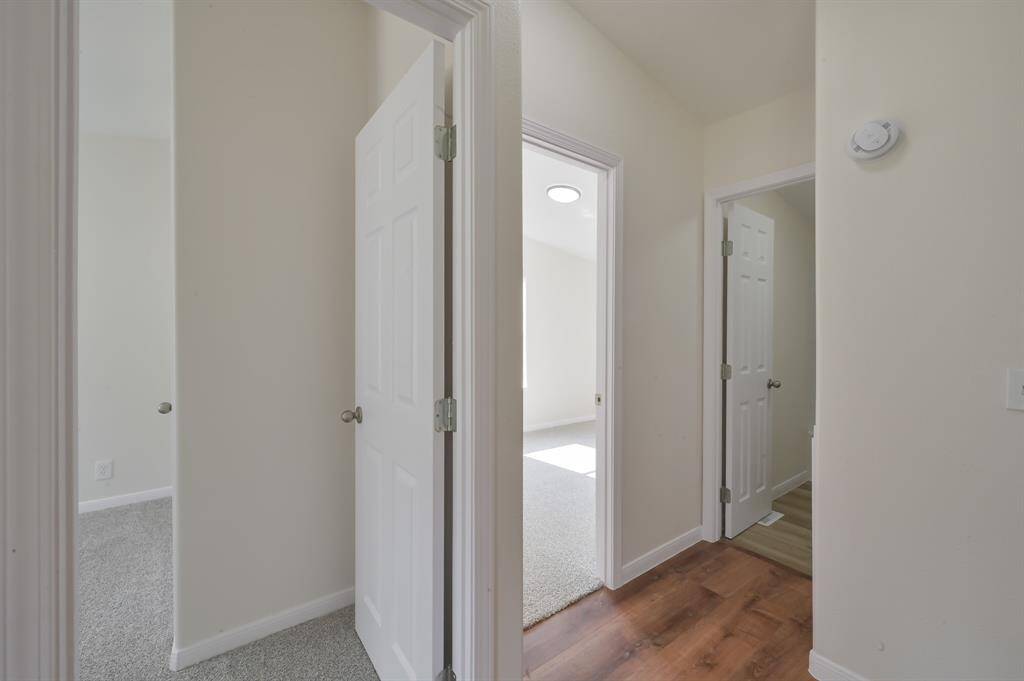 Bedroom1 on the left, Bedroom2 in the center, Hall Bathroom on the right.