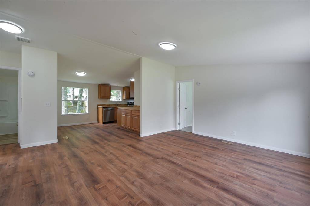 Living Room. Primary bedroom to the right. Hall bathroom, Bedroom1, Bedroom2 on the left.