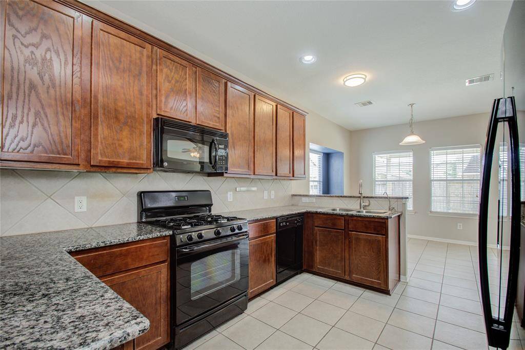Tile in kitchen and dining area