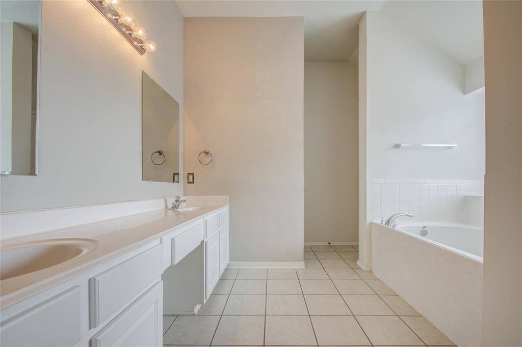 Primary bathroom with dual vanity