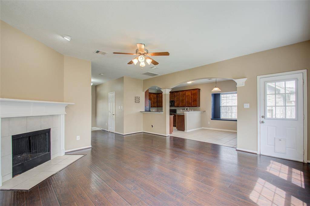 Kitchen looks into family room