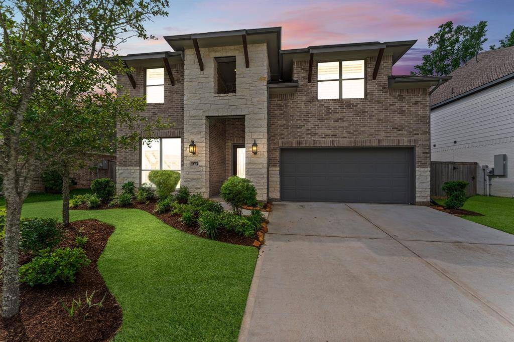 GORGEOUS two story plan in the sought-after master planned community of Grand Central Park!