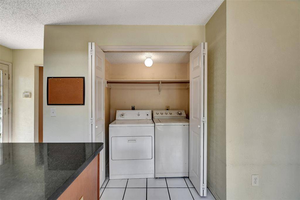 The laundry room is nestled in the Kitchen making it easy for multi-tasking. Has both gas and electric dryer hook-up.