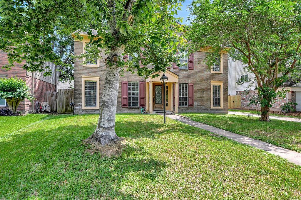 The front yard gives plenty of space for outdoor activities.